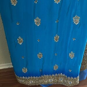 Nice saree with heavy kundan work and stone , heavy work all over the saree